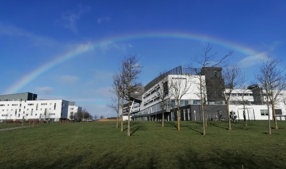 A photo showing a rainbow over the University campus.