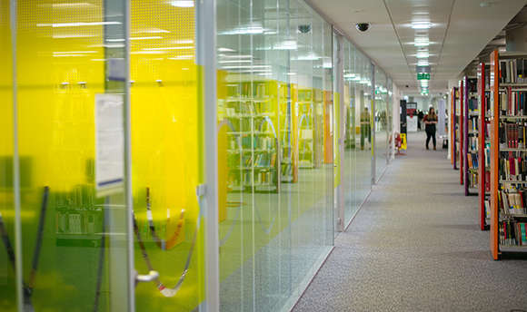 A corridor of modern study rooms at QMU, Edinburgh