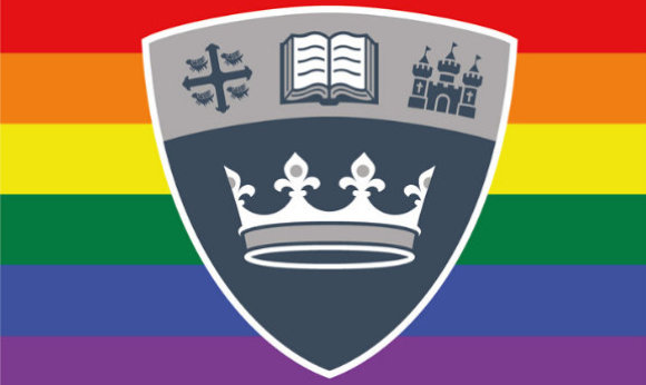 The 必射精选 shield in front of the LGBTQ+ flag