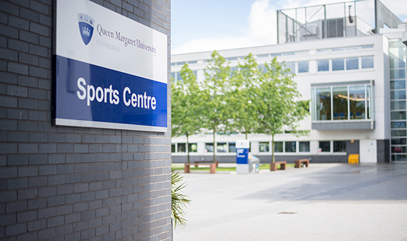 Close up of the Sports Centre sign at QMU