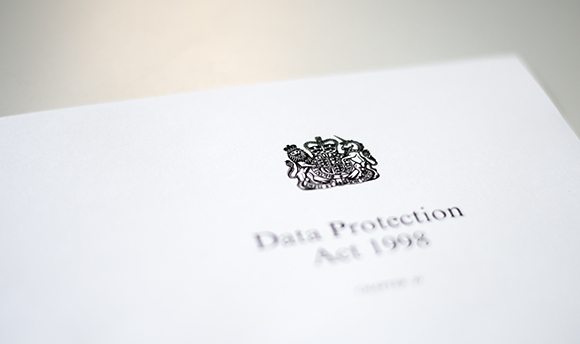 Close up of HM Government logo and Data Protection Act 1988