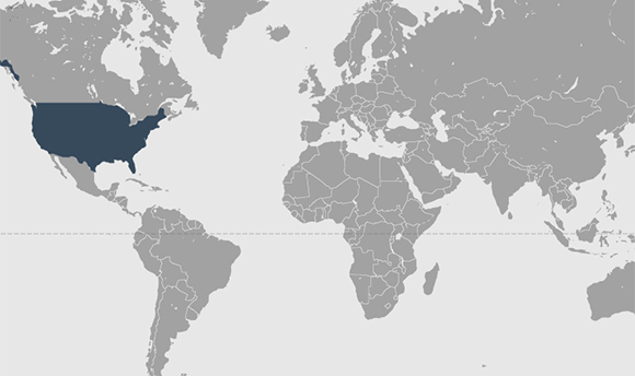 A grey map of the world with America a darker shade than the rest of the land mass